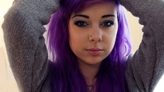 Woman piercings purple hair