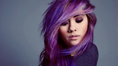 Woman piercings purple hair