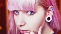 Woman pink hair blue eyes