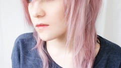 Woman pink hair blue eyes