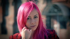 Woman pink hair green eyes