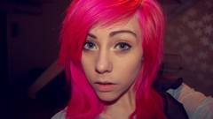 Woman pink hair green eyes Swedish