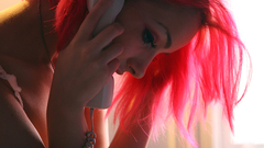 Woman pink hair phones