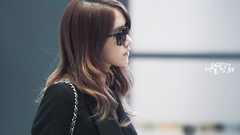 Woman Profile coat sunglasses outdoors asians long hair 