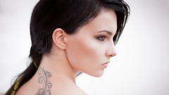 Woman Profile faces tattoos brown eyes brunettes black hair