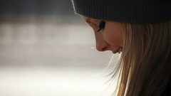 Woman Profile looking down blondes smiling