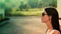 Woman Profile sunglasses tank tops long hair brunettes blurred 