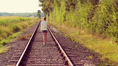 Woman railroad tracks