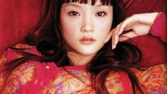 Woman red background Chinese asians long hair bangs