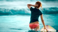 Woman redheads Blue Sea