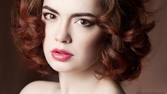 Woman redheads curly hair