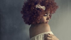 Woman redheads curly hair