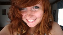Woman redheads freckles smiling