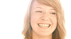 Woman redheads freckles smiling
