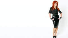 Woman redheads latex skirts