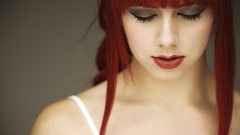 Woman redheads lips closed