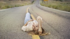 Woman roads lying down