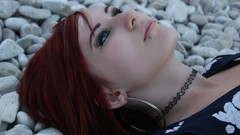 Woman rocks green eyes piercings redheads