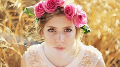 Woman roses flower in hair pink roses looking up