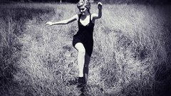 Woman running dress monochrome fields blondes short hair black 