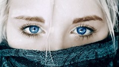 Woman scarfs blue eyes