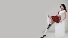 Woman schoolgirls skirts high