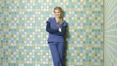 Woman scrubs Eliza Coupe