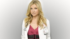 Woman scrubs Sarah Chalke