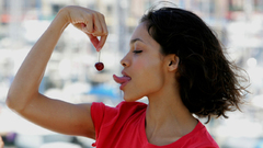 Woman ships cherries tongue shirts brunettes rosario dawson