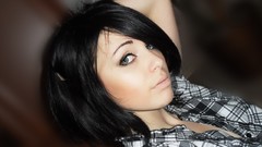 Woman shirts green eyes black hair