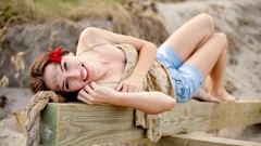 Woman Shorts brunettes laughing models lying down flower in 