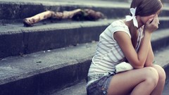 Woman Shorts sitting brunettes pigtails striped clothing