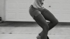 Woman Shorts Skateboarding monochrome skates legs blondes huge 