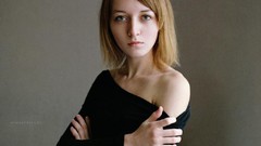 Woman shoulders blondes blue eyes teen grey background