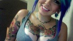 Woman shoulders tank tops tattoos blue hair smiling blue eyes 