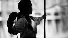 Woman silhouettes bow (weapon) Kyudo