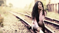 Woman sitting asians vietnamese railroad tracks
