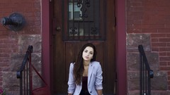 Woman sitting green eyes emily rudd