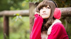 Woman sitting outdoors asians brunettes bangs earmuffs upscaled