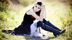 Woman sitting pale boots models Neon Lynxie