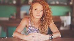 Woman sitting piercings