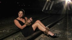 Woman sitting Ropes vehicles bondage models black dress ashley 