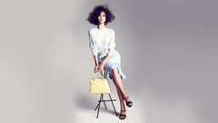 Woman sitting skirts brunettes models curly hair