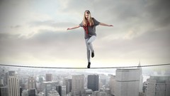 Woman Skyscrapers looking down Ropes balance blondes scarfs 