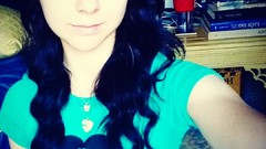 Woman smiling blue eyes black hair self shot selfshot