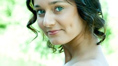 Woman smiling blue eyes models black hair curly hair girls in 