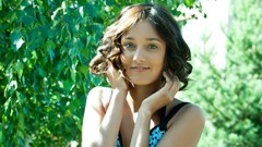 Woman smiling blue eyes models black hair curly hair girls in 