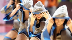 Woman smiling dancers cheerleaders depth of field hooded