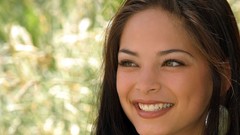 Woman smiling Kristin Kreuk