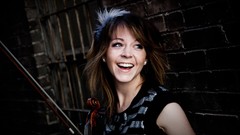 Woman smiling violinist Lindsey Stirling Violate